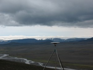 This global positioning satellite receiver is part of Iceland's network of 62 such receivers that geoscientists are using to detect movements of the Icelandic crust that are as small as one millimeter per year. Langjökull glacier can be seen in the background. Credit: Richard A. Bennett/ University of Arizona
