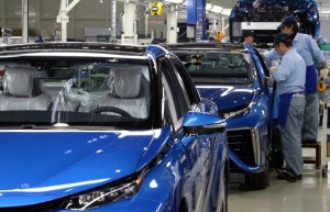 Toyota workers assemble the Mirai, which runs off hydrogen, at the automaker's Motomachi plant in Japan on Tuesday.    Credit:Tomohiro Ohsumi/Bloomberg