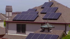 stock-footage-circa-s-aerial-of-solar-panels-adorning-the-tops-of-houses-in-a-residential-neighborhood