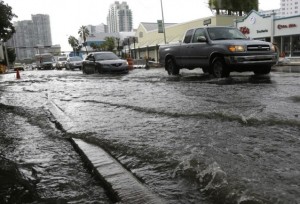 Miami streets see heavy flooding from rain in September 2014. Some neighborhoods flood regularly during deluges or extreme high tides. Credit: AP Photo/Lynne Sladky