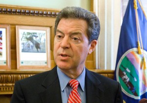Gov. Sam Brownback said he hoped to add about 2,000 private sector jobs a month in Kansas during his second term, but the state has fallen far short of that figure so far in 2015. Credit: Thad Allton/AP|  