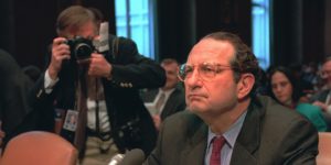  A photographer closes in on CIA Director John Deutch on Capitol Hill on Feb. 22, 1996, prior to a hearing of the Senate Intelligence Committee. Deutch and other intelligence officials had made statements about the use of chemical weapons during the Gulf War—that no such weapons were used—that contradicted the findings of Eddington and his wife.